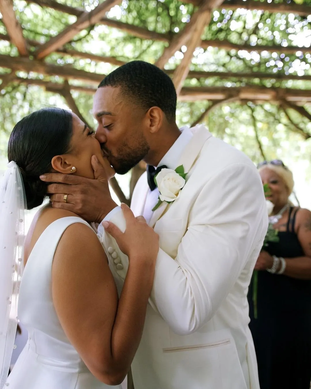Alondra + DeVaughn celebrating after the ceremony at Cop Cot Wedding , Central Park