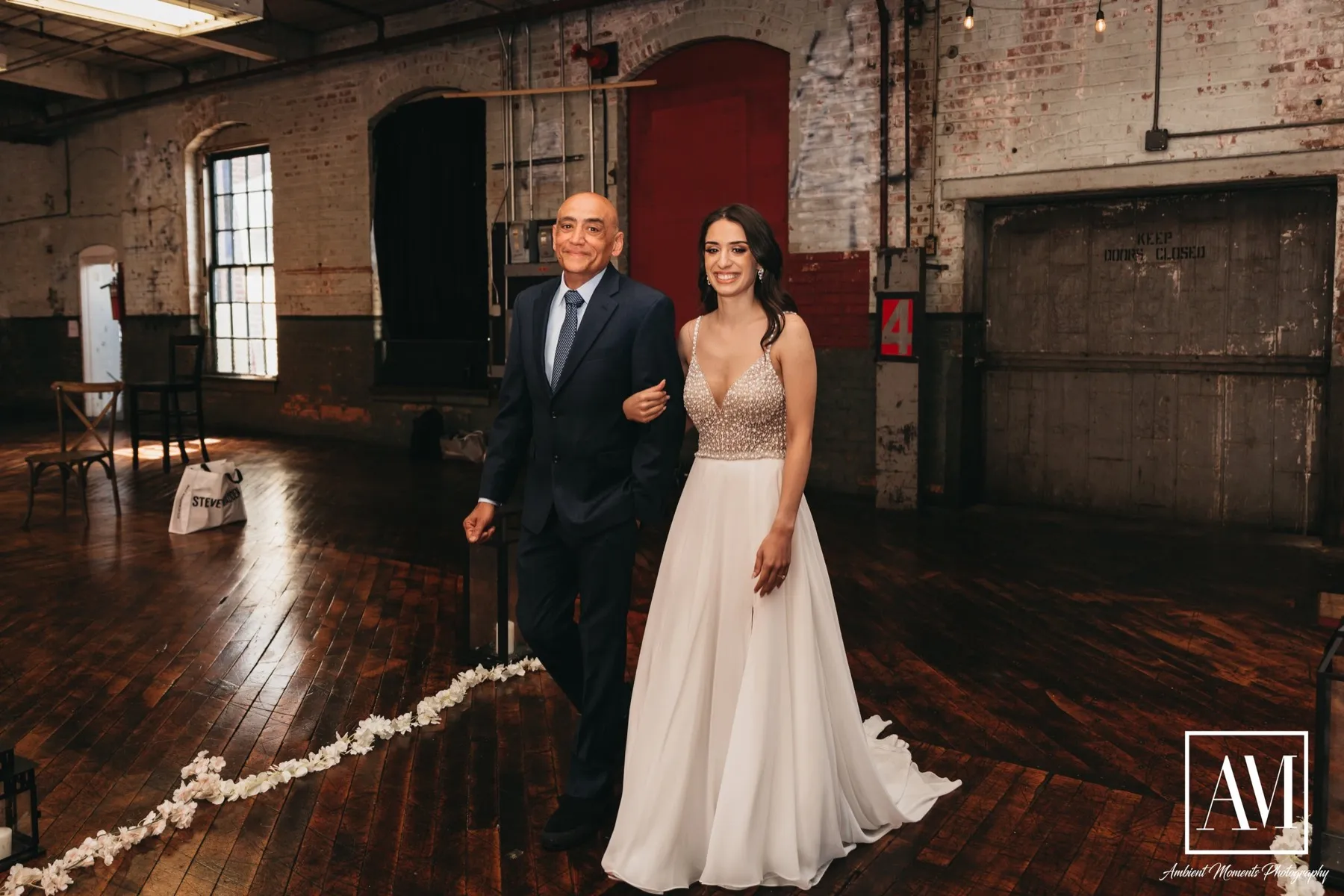 Amanda + Kevin celebrating after the ceremony at Art Factory Studios, Paterson, NJ