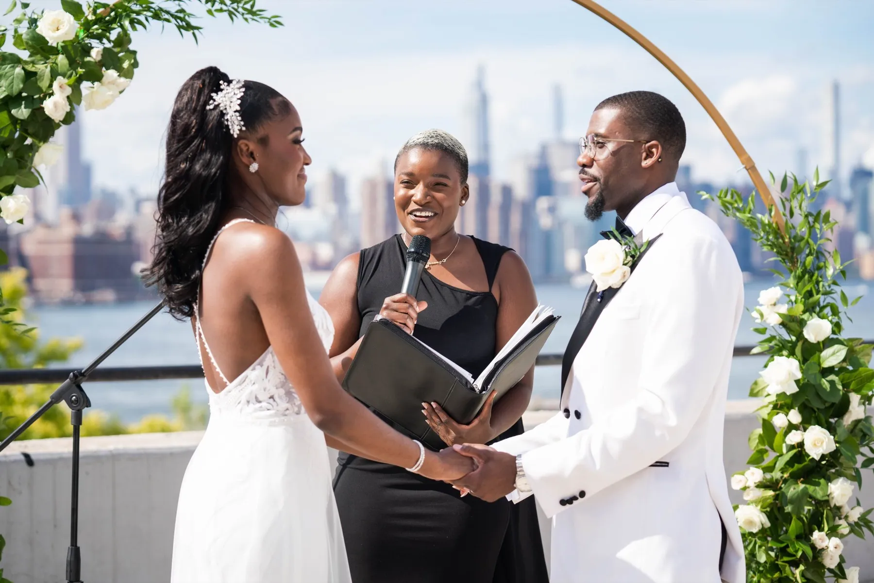 Arielle + Romell celebrating after the ceremony at The W Loft, Brooklyn, NY
