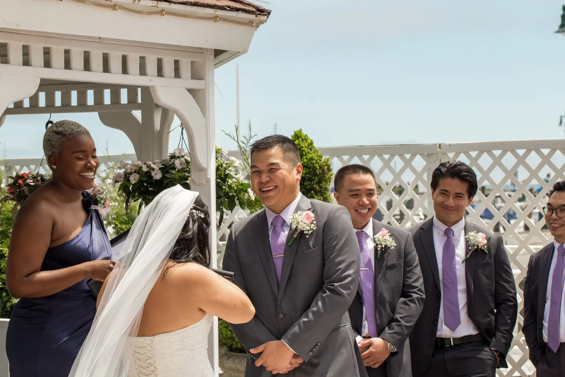 Stephanie + Justin celebrating after the ceremony at Chateau La Mer