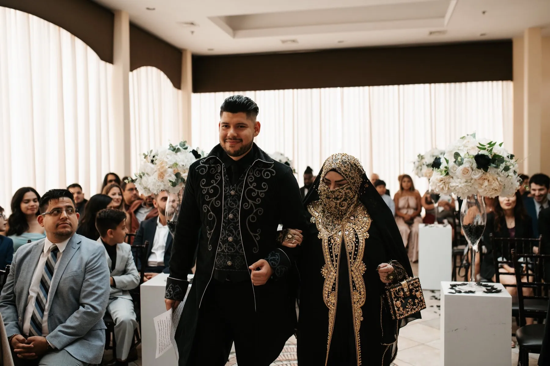 Erika + Willie celebrating after the ceremony at The Elan, Lodi, NJ