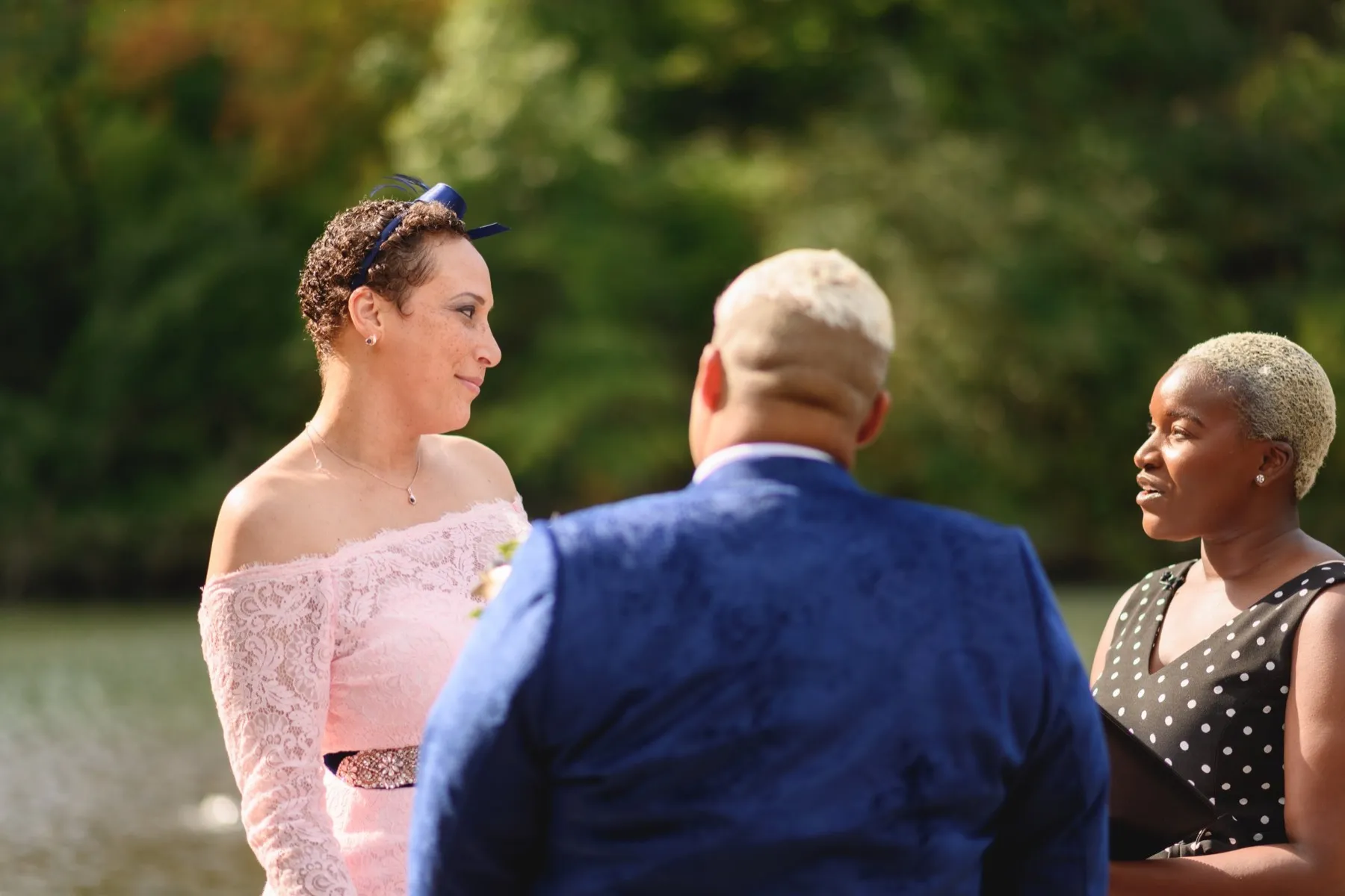 Wedding day moment for Veronica + Julie at Gapstow Bridge, Central Park Wedding