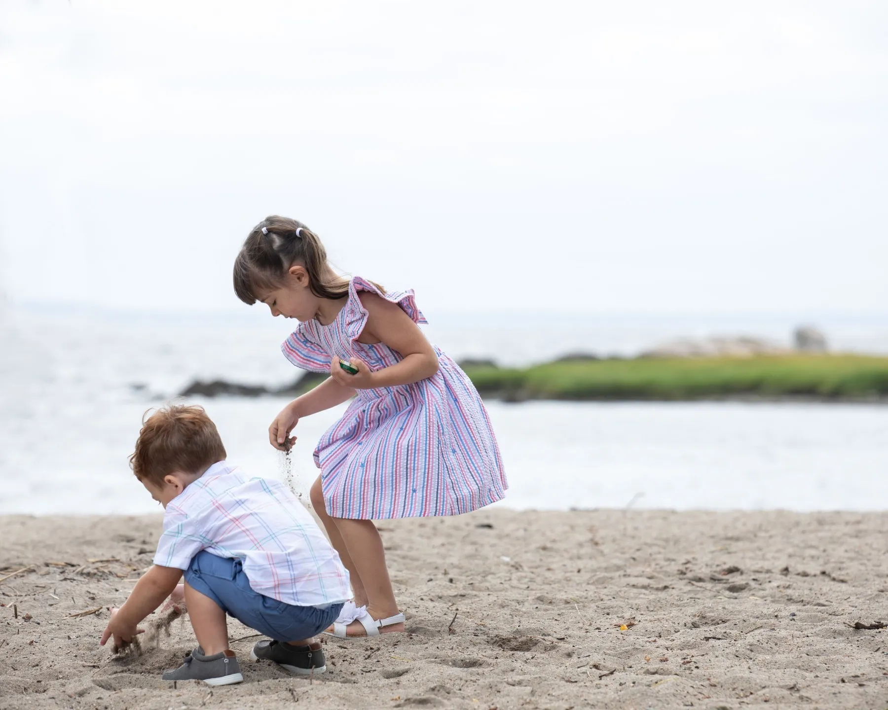 Jamie + Scott exchanging vows at Cove Island Beach, Stamford, CT