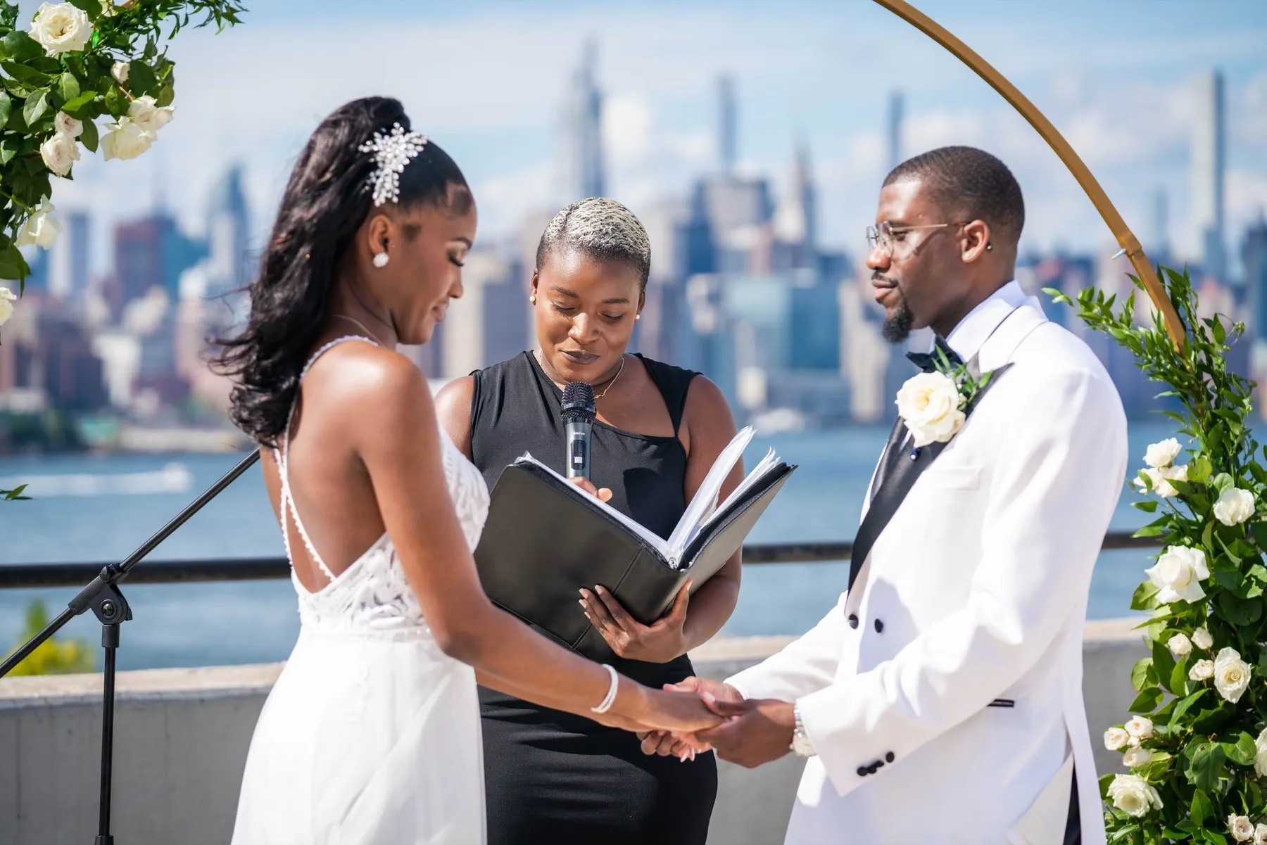 Arielle + Romell celebrating after the ceremony at The W Loft, Brooklyn, NY