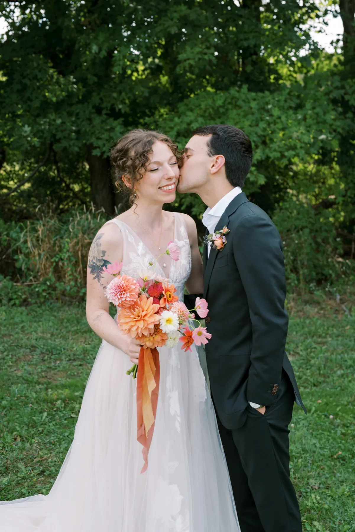 Zoie + Mark celebrating after the ceremony at Sunny River Estates, Hudson Valley, NY
