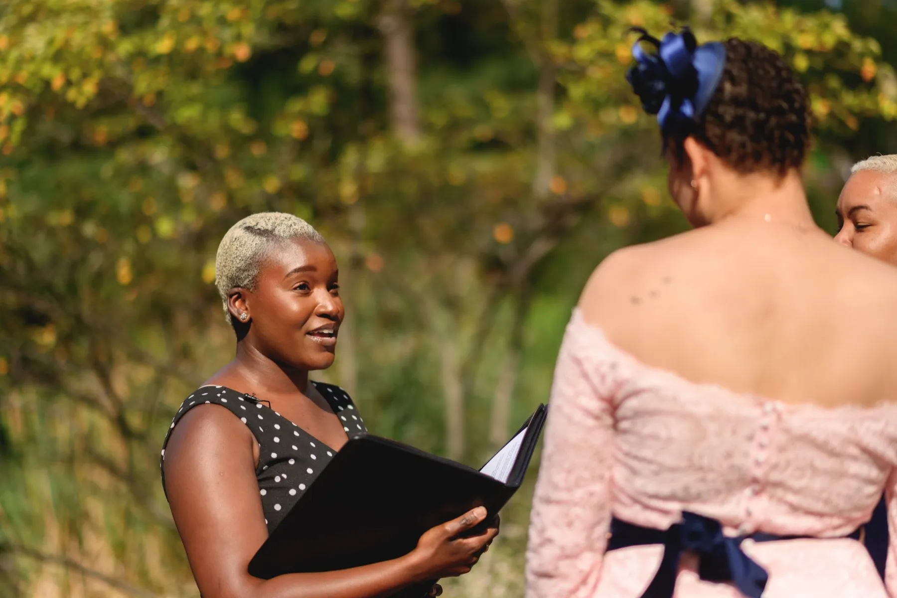 Wedding day moment for Veronica + Julie at Gapstow Bridge, Central Park Wedding