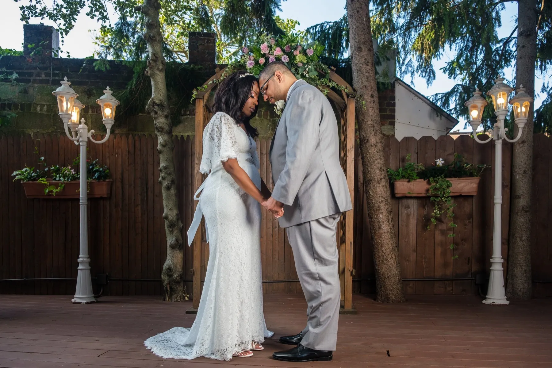 Camille + Francisco exchanging vows at My Kitchen Forest Hills, NY
