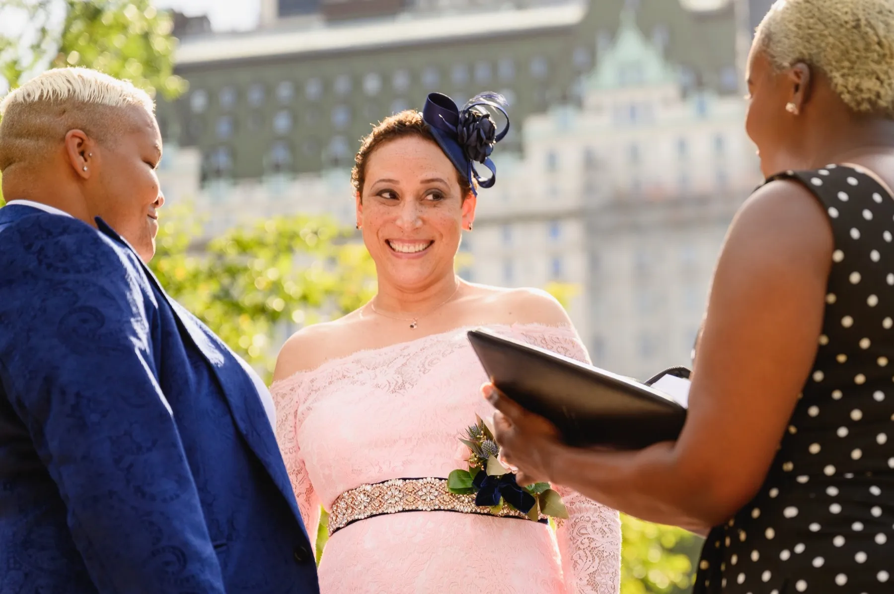 Veronica + Julie exchanging vows at Gapstow Bridge, Central Park Wedding