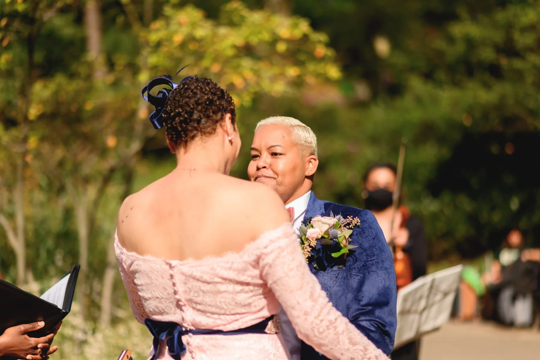 Wedding day moment for Veronica + Julie at Gapstow Bridge, Central Park Wedding