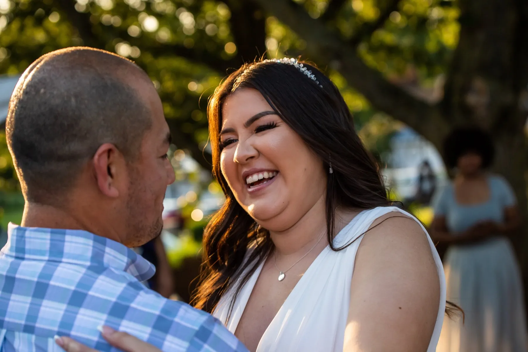 Leslie + Michael celebrating after the ceremony at Bridgeport, CT