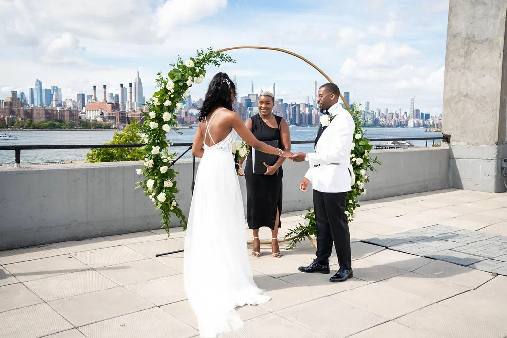 Arielle + Romell celebrating after the ceremony at The W Loft, Brooklyn, NY