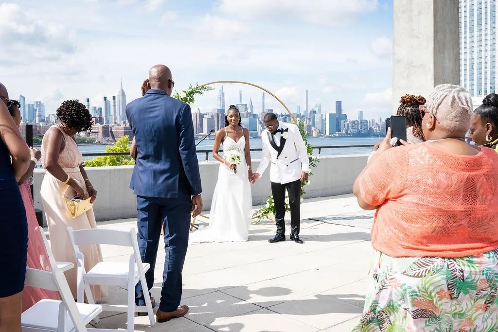 Arielle + Romell during their custom wedding ceremony