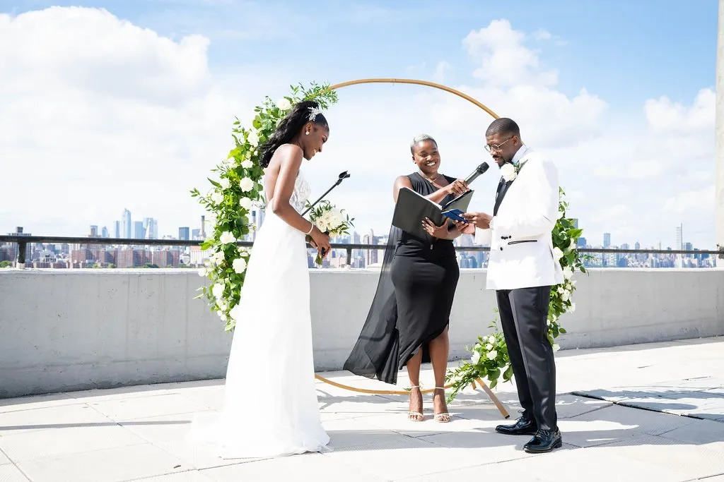 Arielle + Romell celebrating after the ceremony at The W Loft, Brooklyn, NY