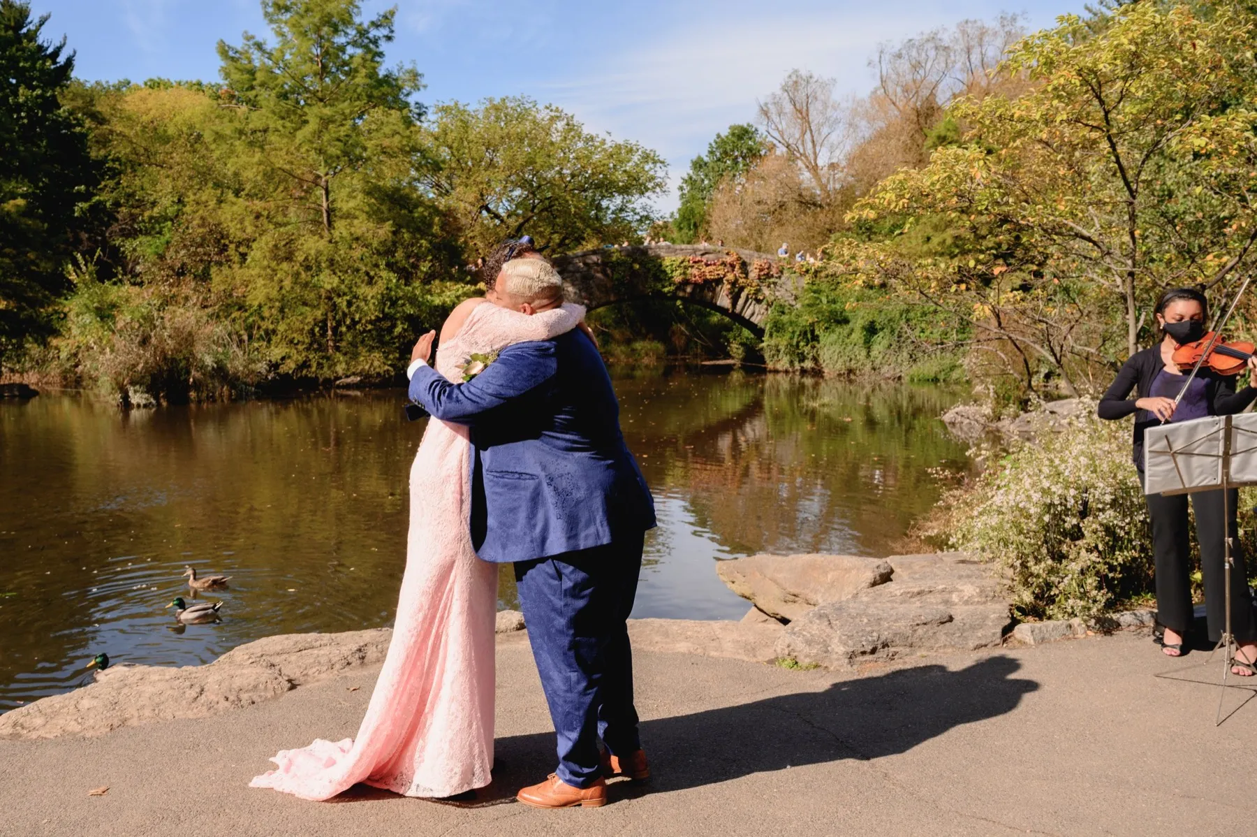 Veronica + Julie wedding ceremony at Gapstow Bridge, Central Park Wedding