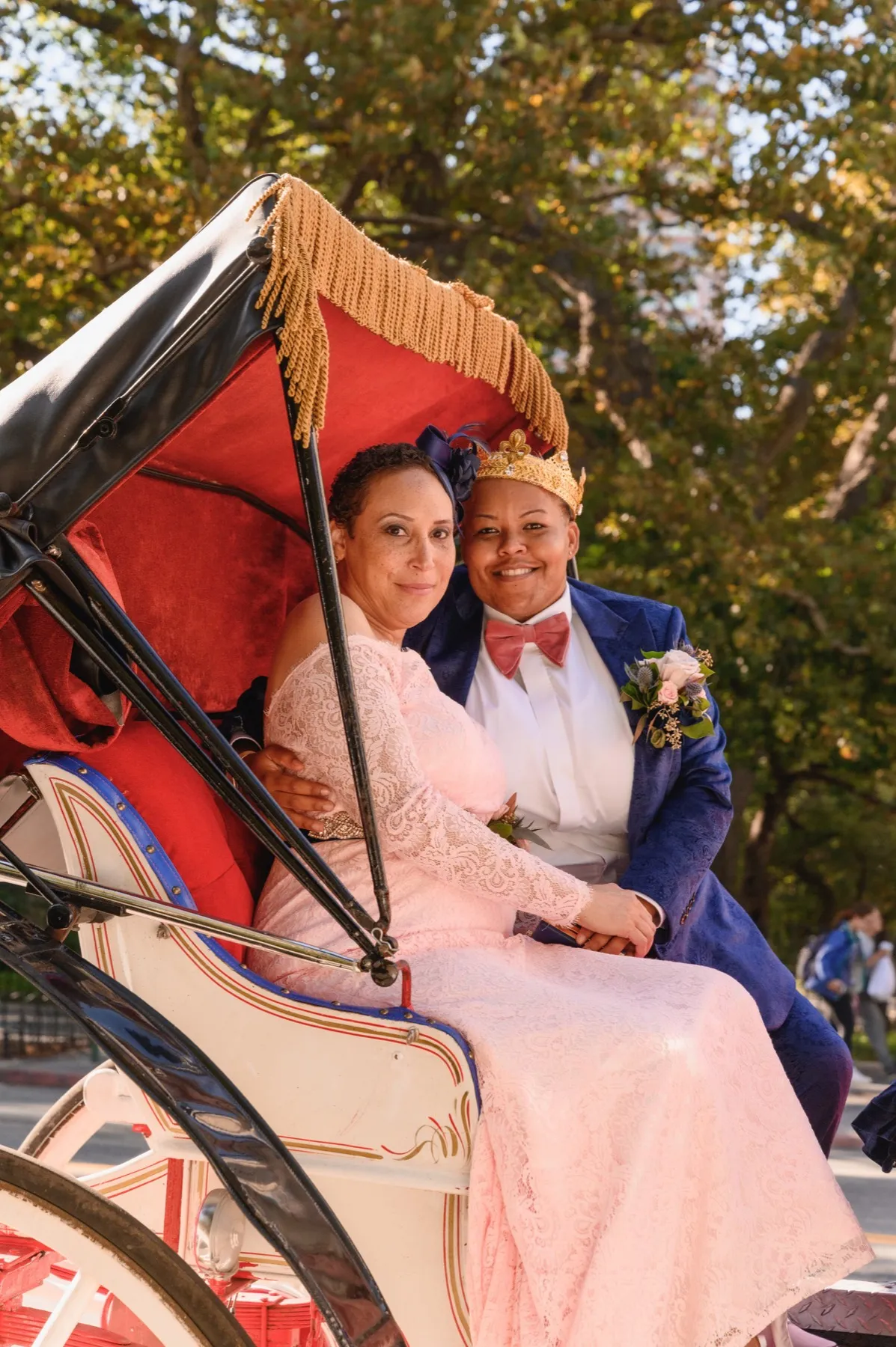 Wedding day moment for Veronica + Julie at Gapstow Bridge, Central Park Wedding
