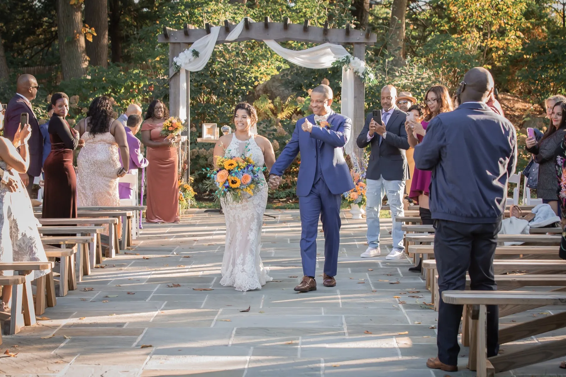 Millie + Rick celebrating after the ceremony at THC The Hops Company, CT