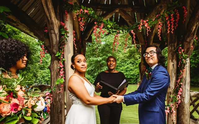 A couple exchanging vows during an intimate DIY wedding ceremony