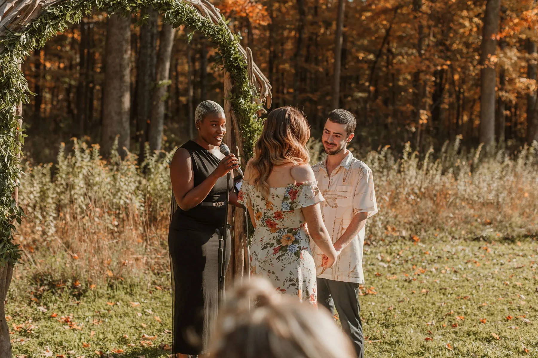 A couple at the altar during their wedding ceremony, Hudson Valley