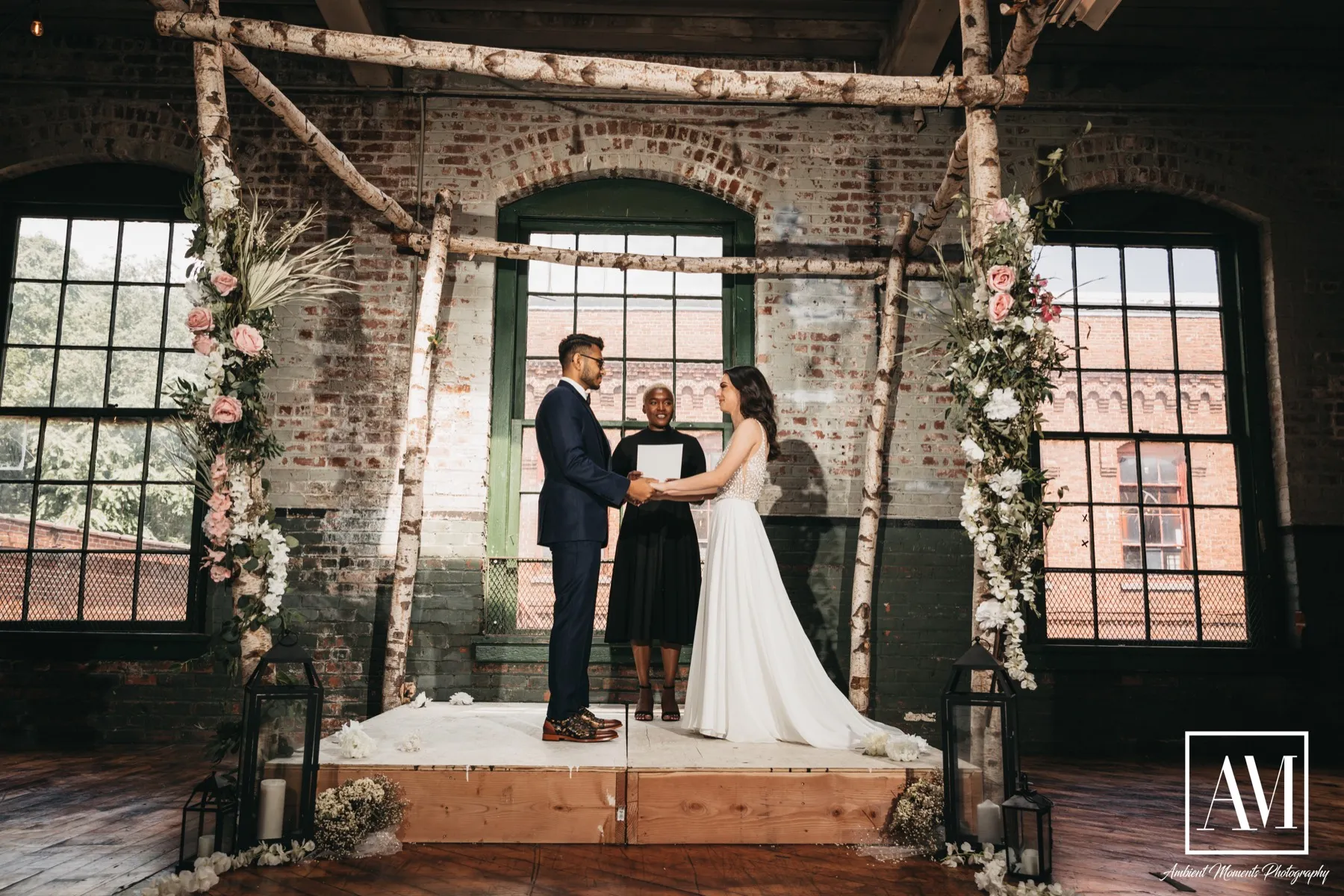 An intimate elopement ceremony at a garden arch in NYC