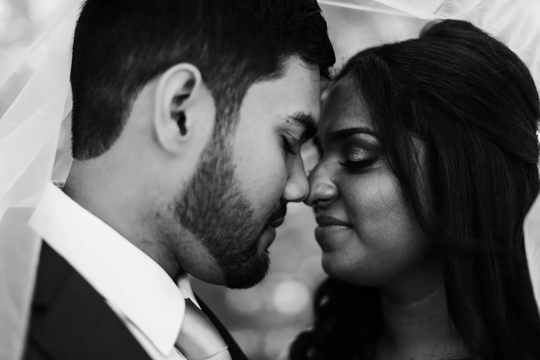 A couple reading hand-written wedding vows