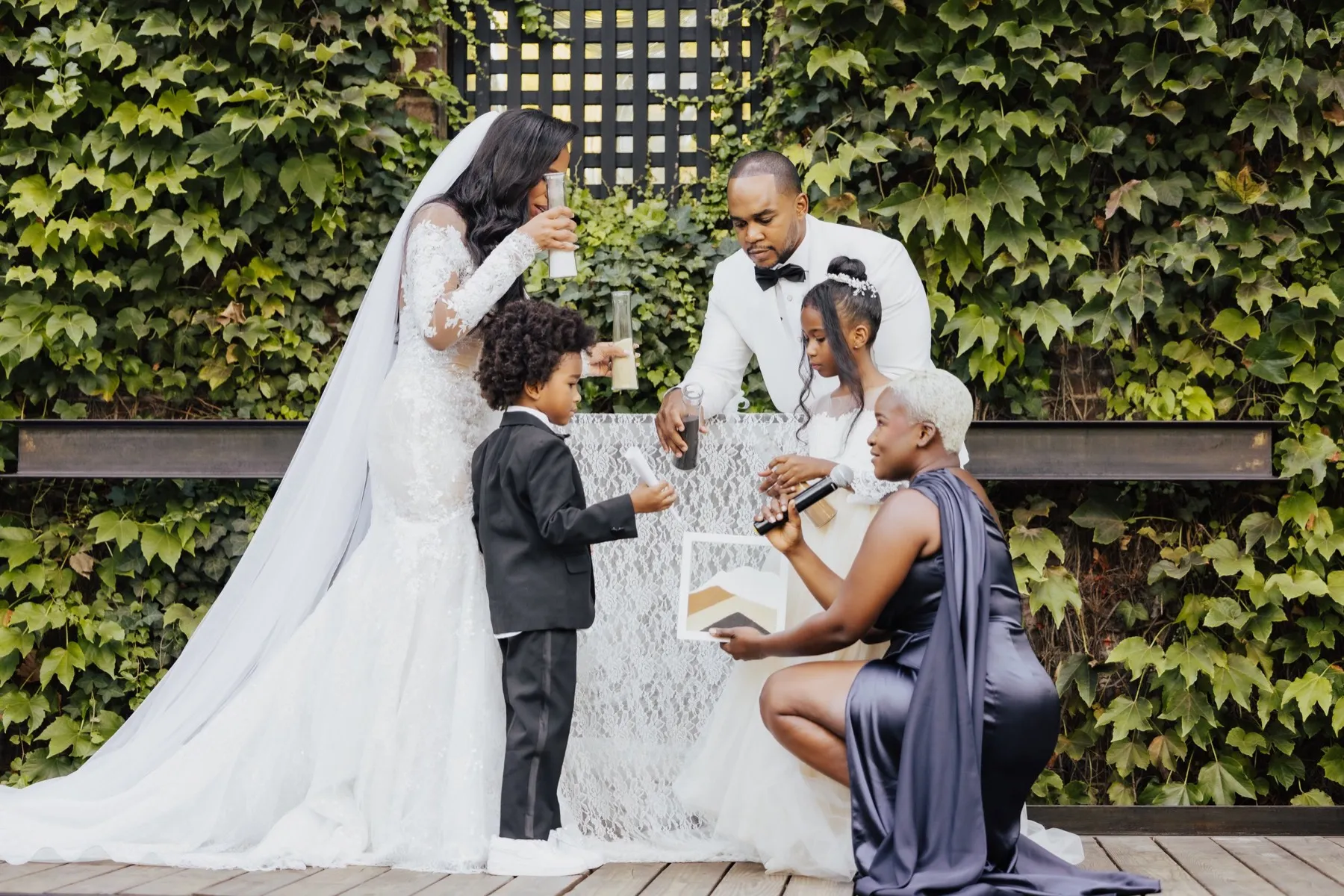 A couple performing a unity ceremony during their wedding
