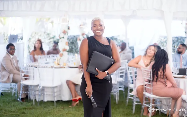 Robyn speaking warmly during a wedding ceremony