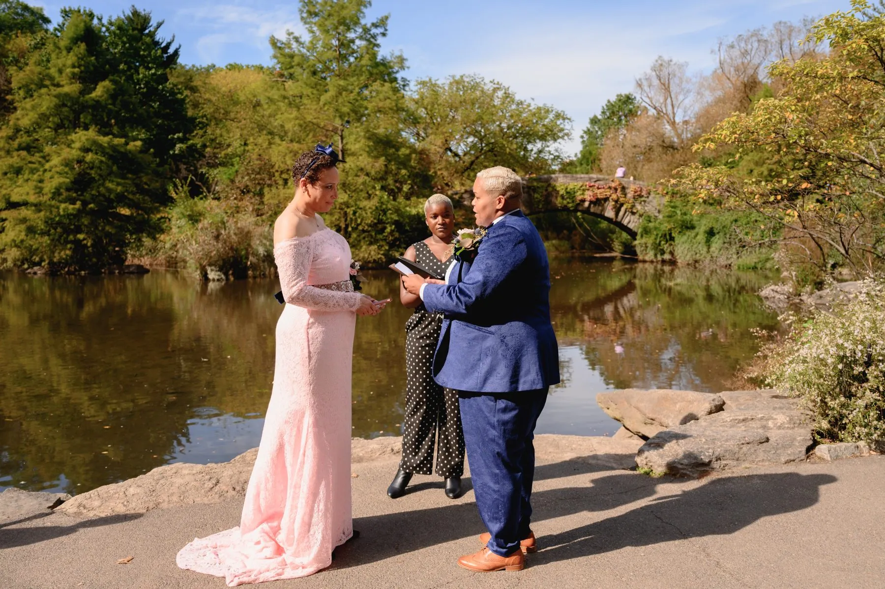 A couple renewing their vows at Bow Bridge, Central Park