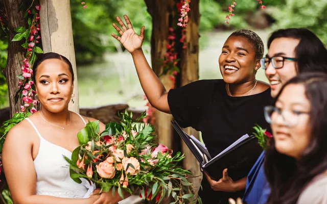 A newly married couple celebrating in Central Park